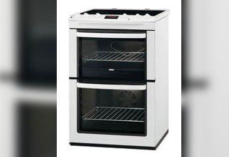 Freestanding cooker/oven against a light background.