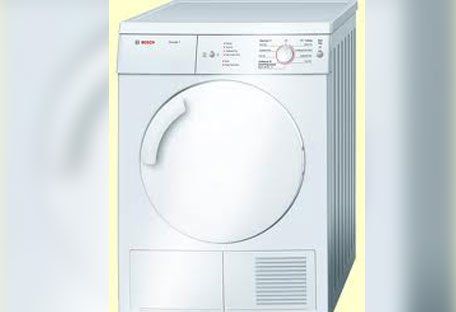 Freestanding white laundry appliance.